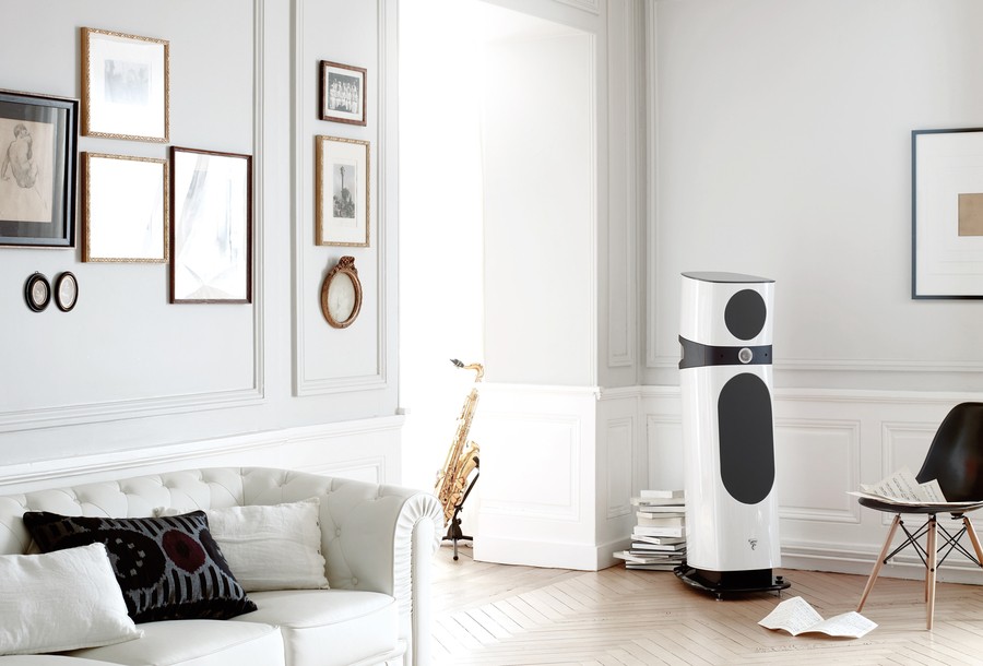 A Focal loudspeaker in the corner of a brightly lit living room.