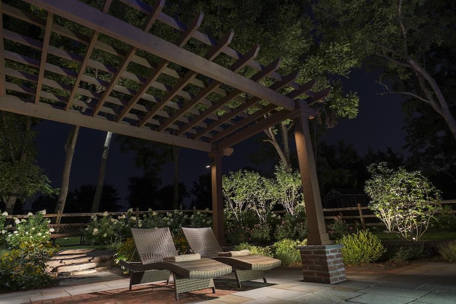 A luxury patio with Coastal Source lighting.